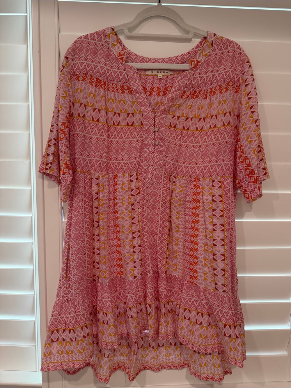 XiRENA Pink Geometric Short-Sleeve Tunic with Yellow Accents